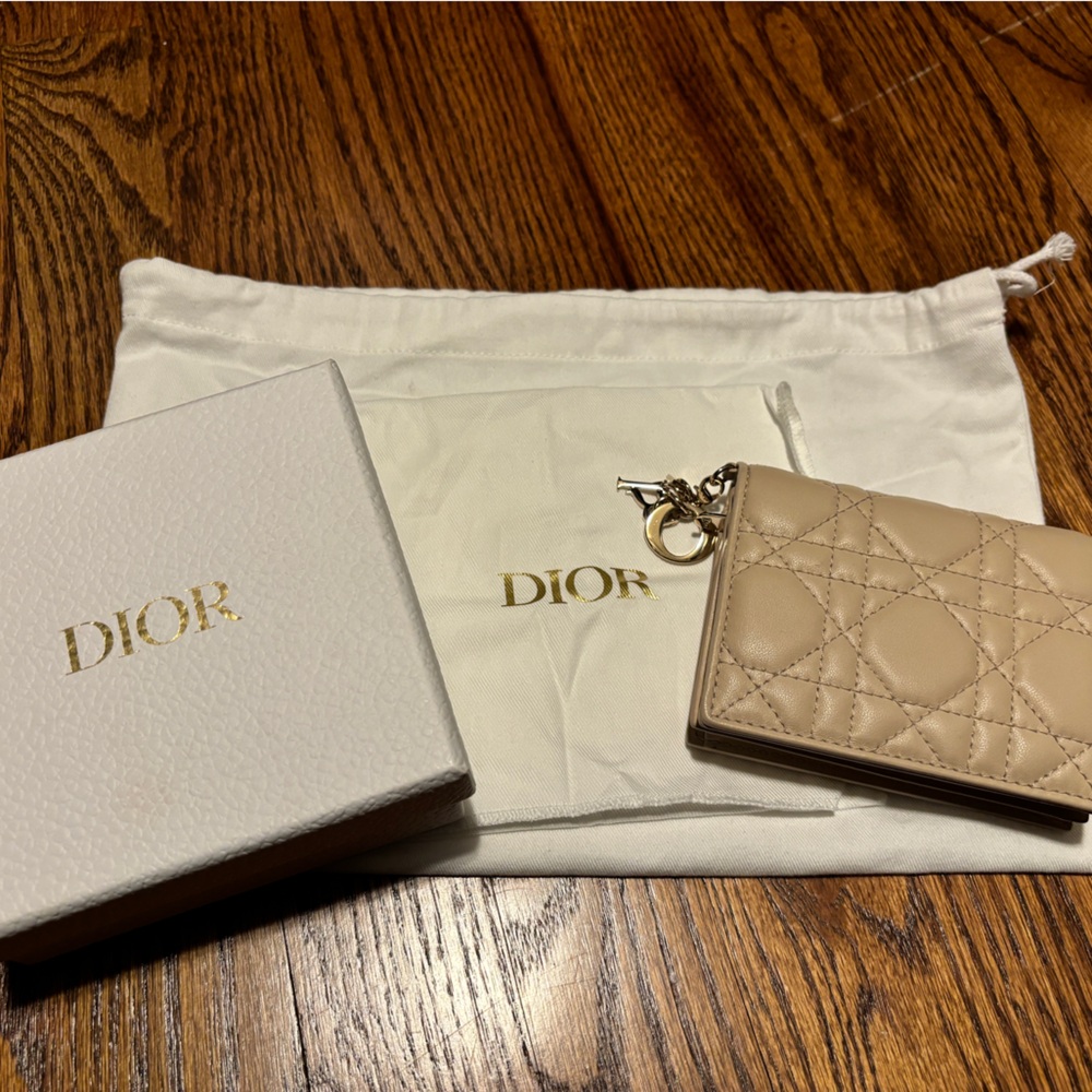 The Lady Dior Gardenia wallet in Biscuit. Comes with box and dust bag.